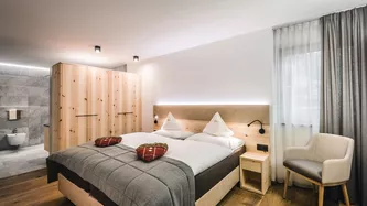 Double bedroom boutique apartments in Colfosco